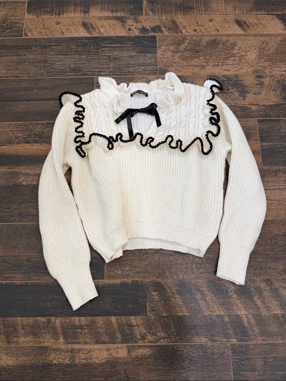 SHEIN Cream Cable Knit Sweater with Black Ruffle Trim and Bow